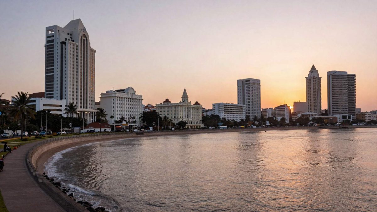 Aerial view of Marine Drive promenade and waterfront hotels in Mumbai at golden hour