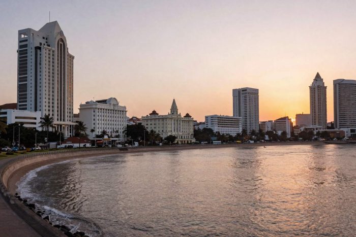 Aerial view of Marine Drive promenade and waterfront hotels in Mumbai at golden hour